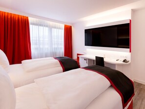 Standard Double or Twin Room | Minibar, in-room safe, desk, iron/ironing board