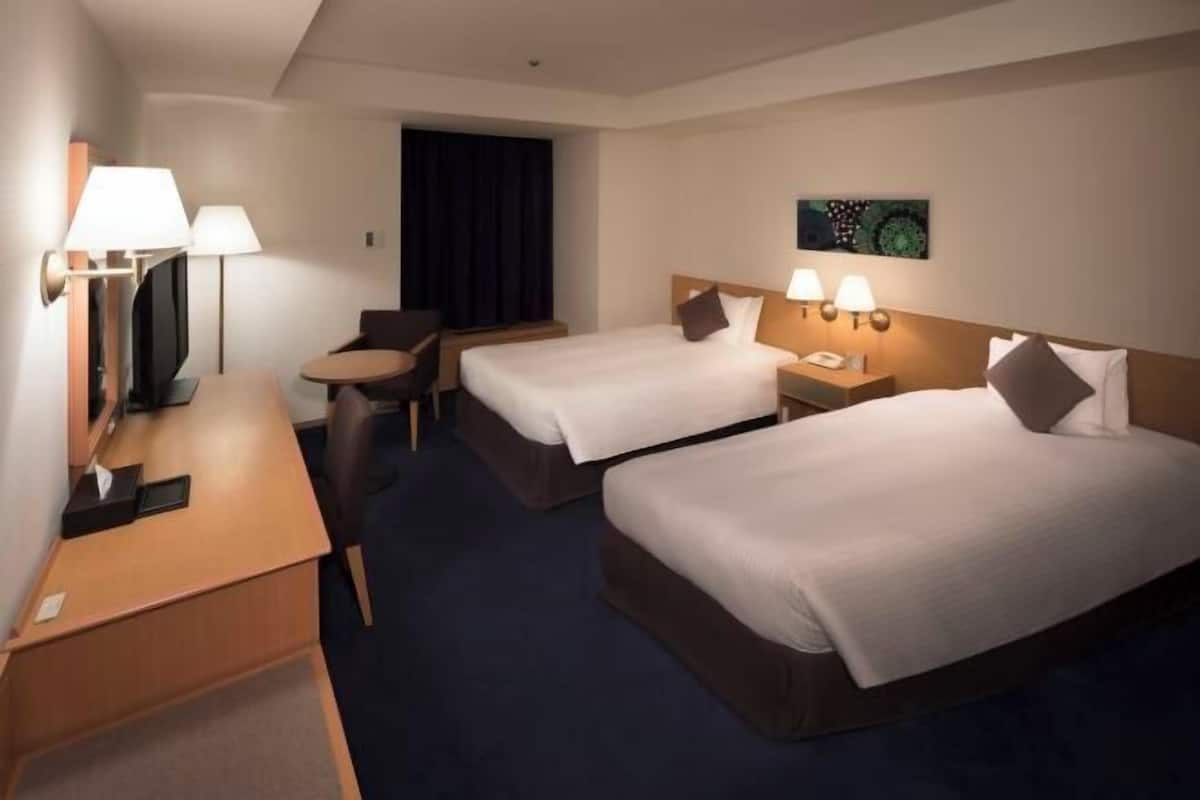 Down comforters, individually furnished, blackout drapes, free WiFi