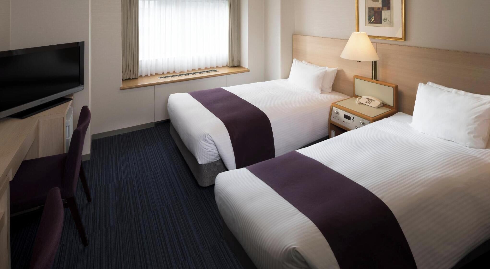 Down duvets, individually furnished, blackout curtains, free WiFi