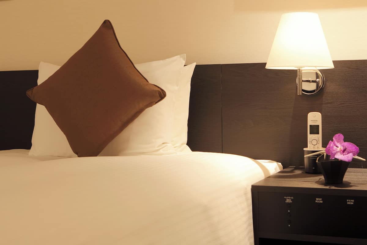 Down comforters, individually furnished, blackout drapes, free WiFi