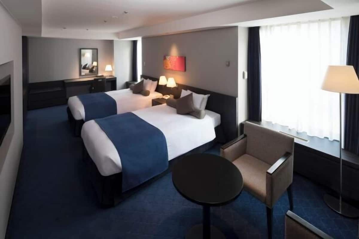 Down comforters, individually furnished, blackout drapes, free WiFi