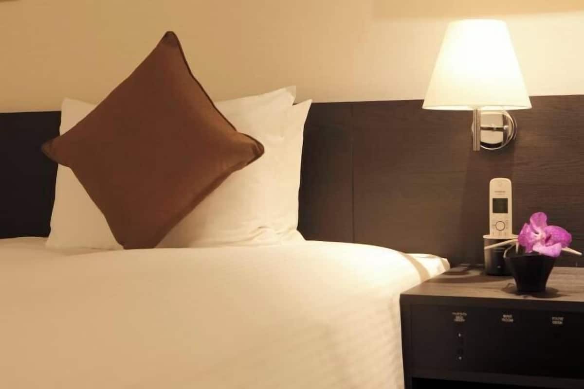 Down comforters, individually furnished, blackout drapes, free WiFi