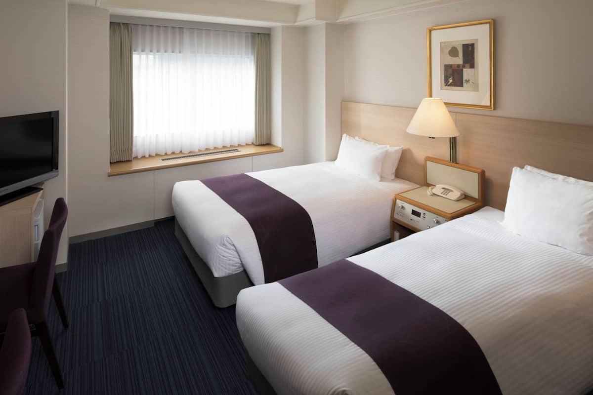 Down comforters, individually furnished, blackout drapes, free WiFi