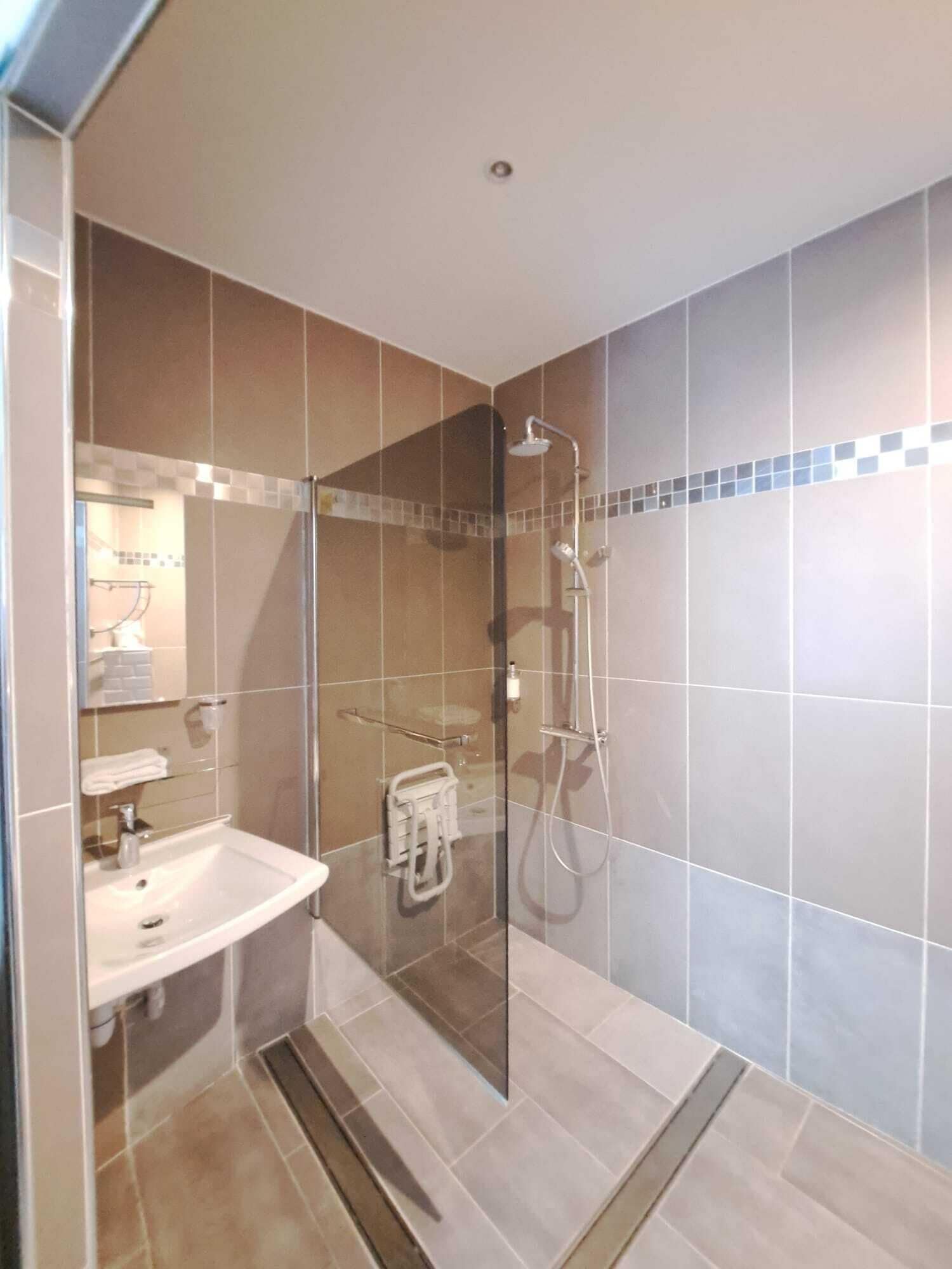 double room ground floor- street | bathroom | shower, free toiletries, hair dryer, towels