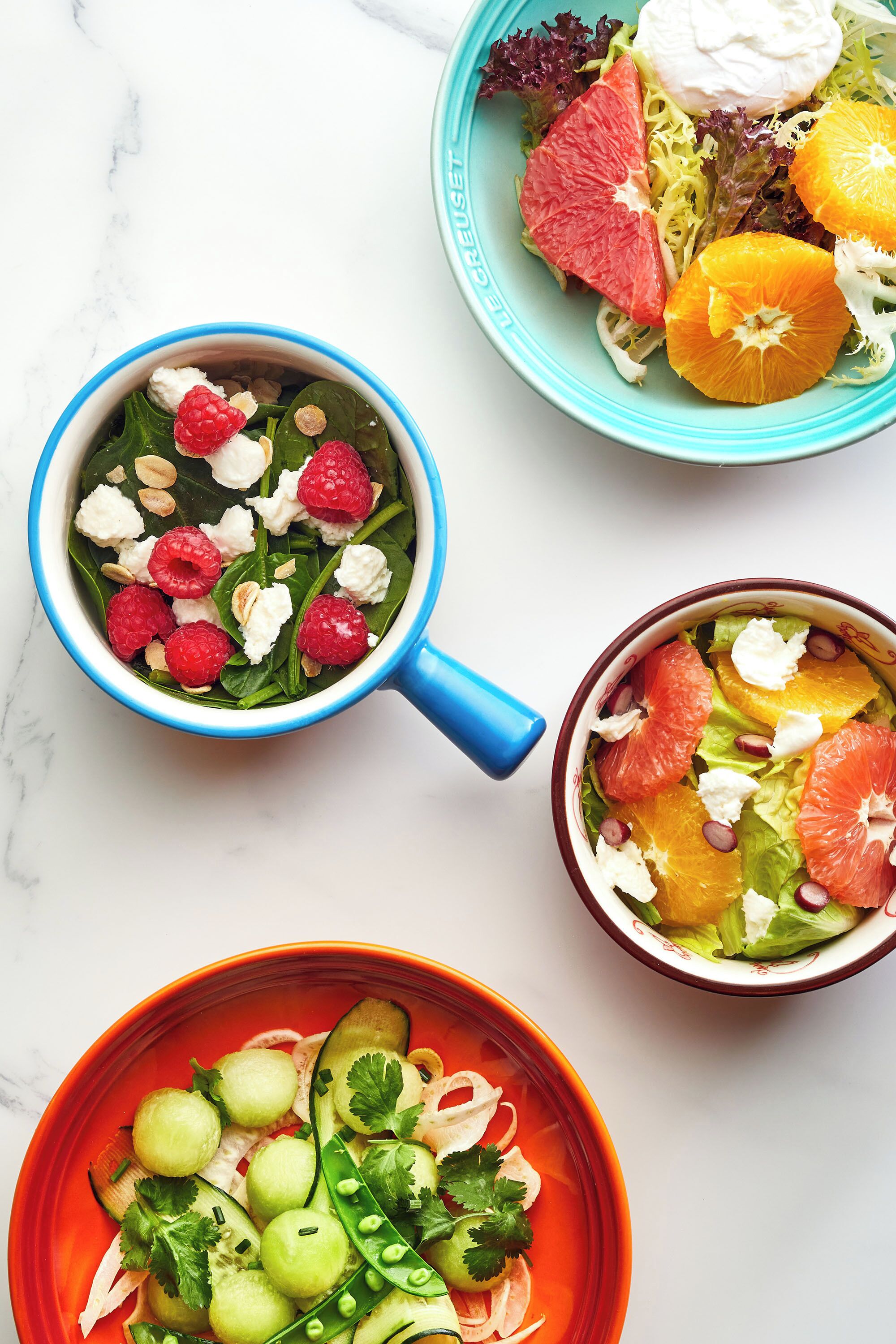 Three bowls of food with different ingredients.