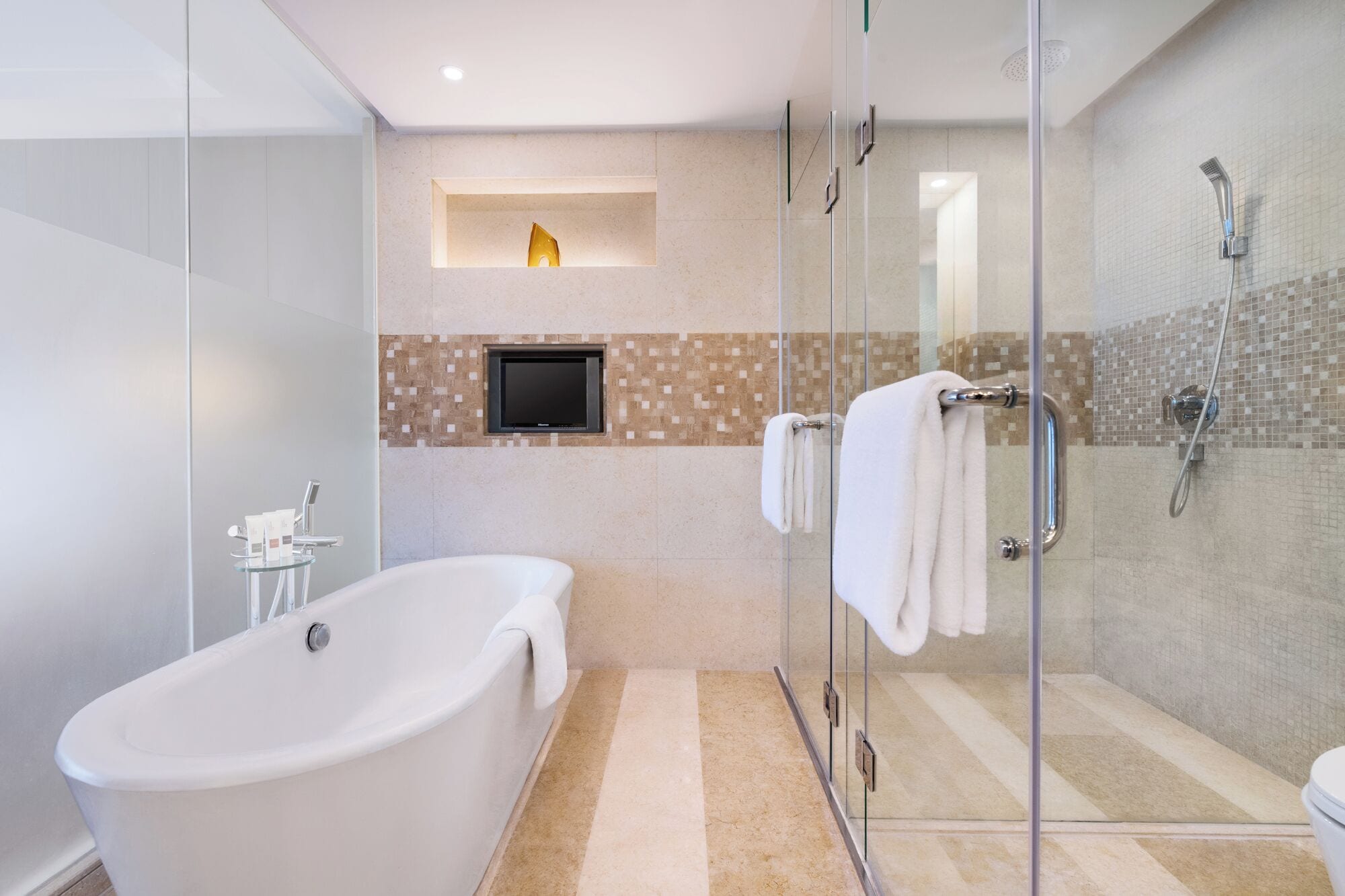 pinnacle suite | bathroom | separate bathtub and shower, free toiletries, hair dryer, bathrobes