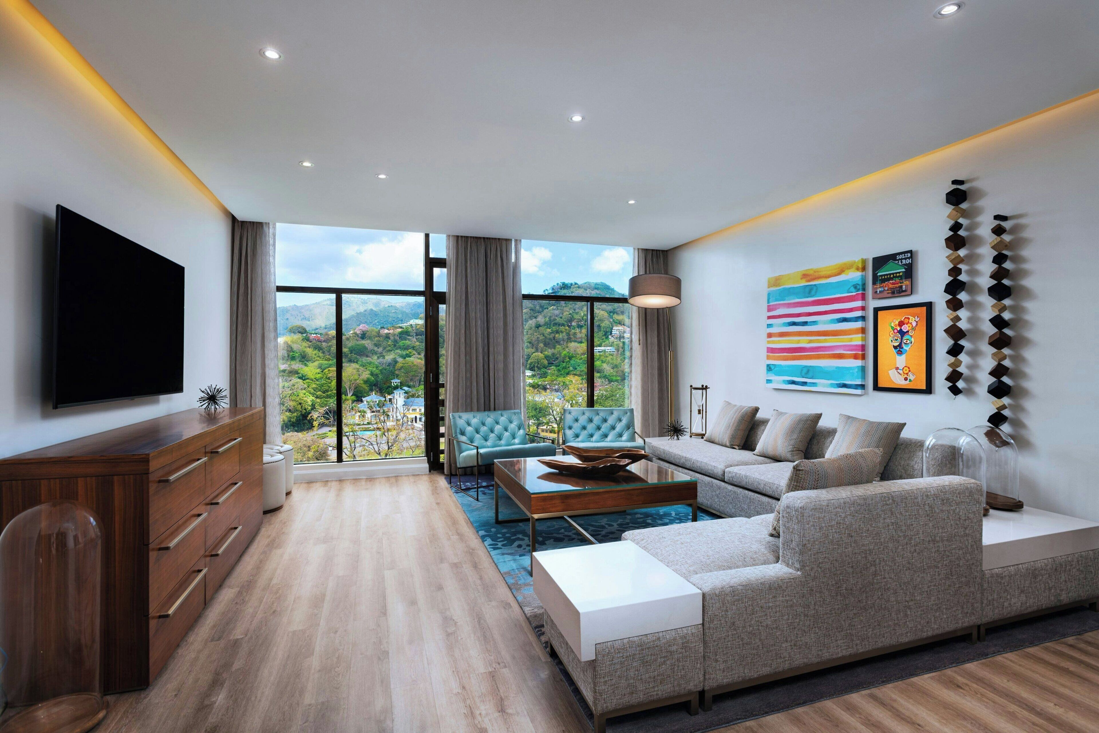 royal suite, 1 king bed (island) | living room | 55-inch flat-screen tv with cable channels, tv