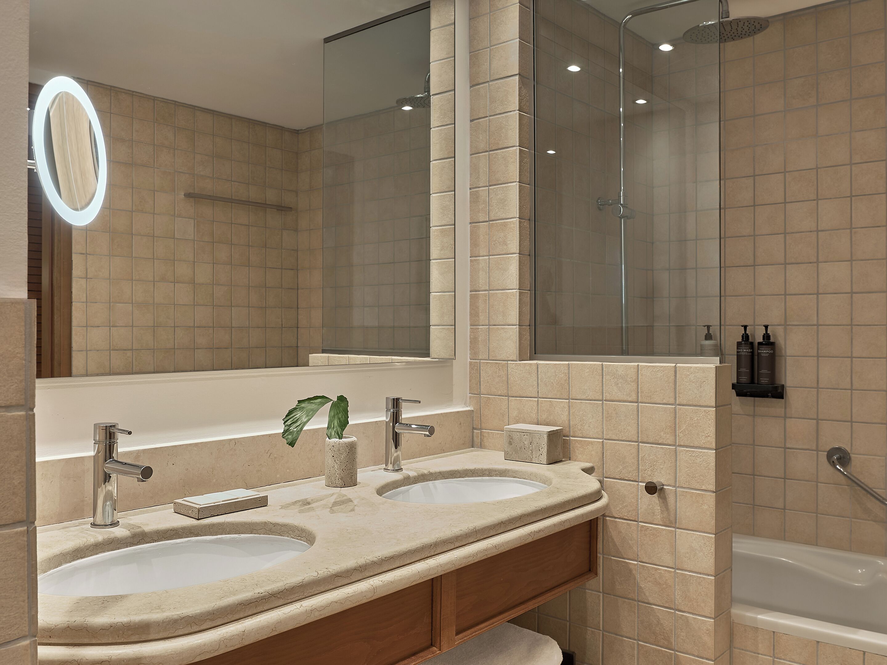 combined shower/bathtub, free toiletries, hair dryer, bathrobes