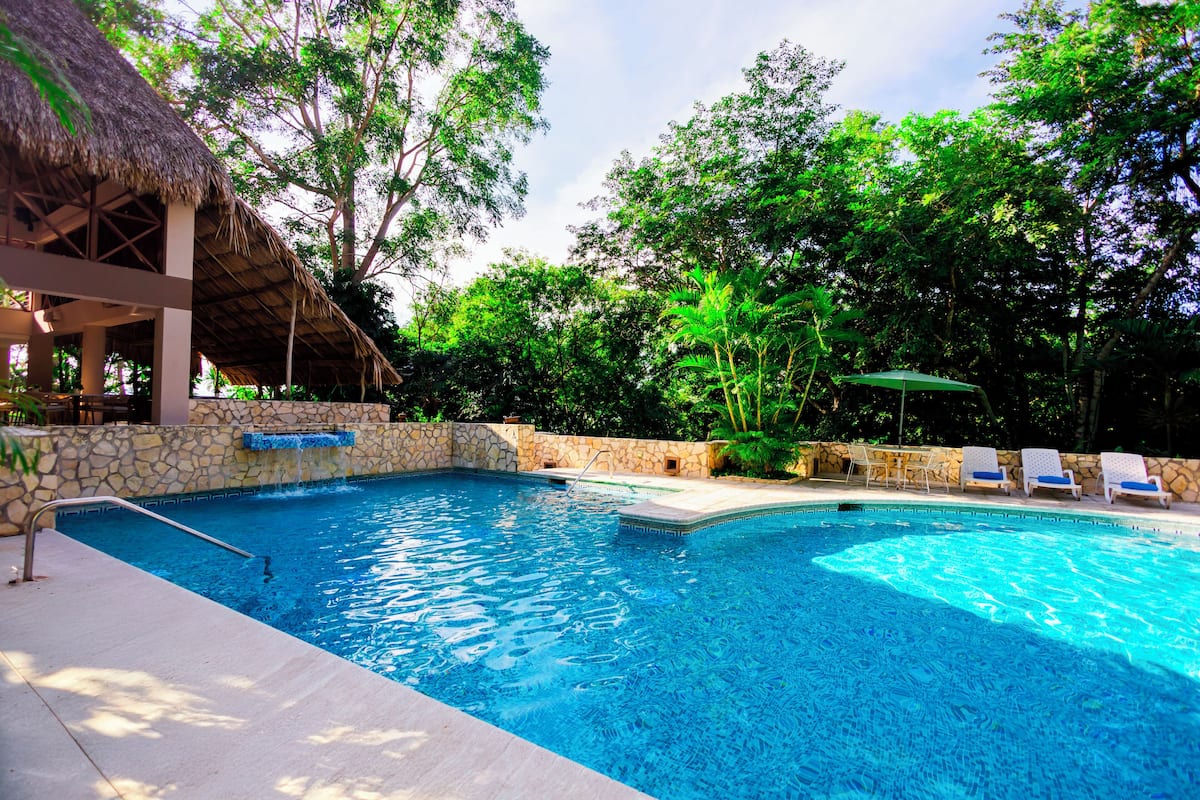 outdoor pool, pool loungers