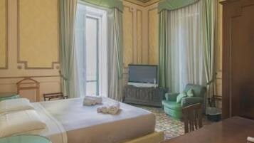 Premium bedding, down duvets, minibar, in-room safe