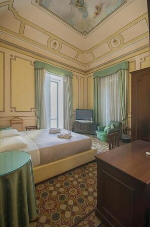 Premium bedding, down comforters, minibar, in-room safe