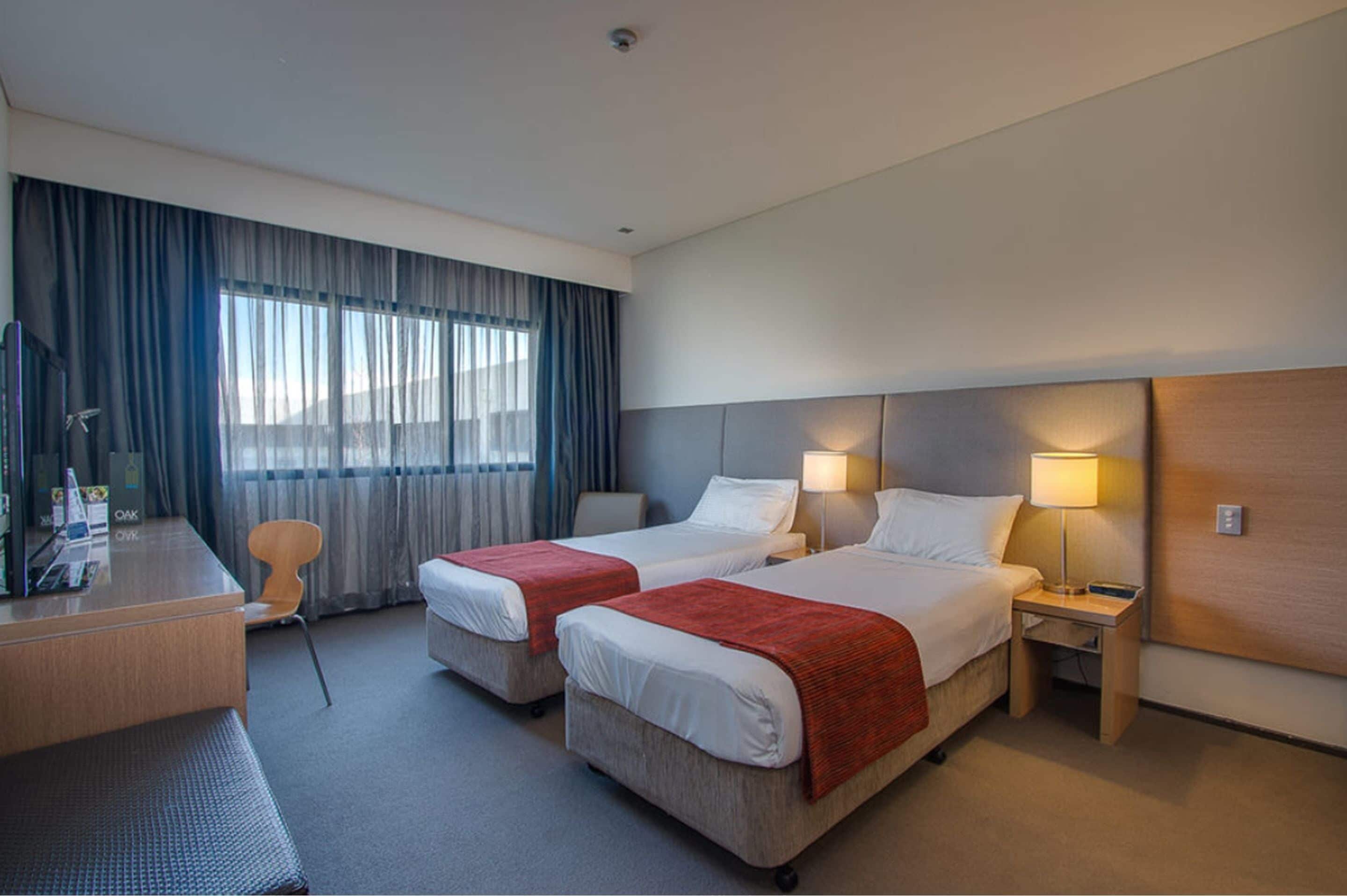 standard twin room, 2 single beds | 1 bedroom, in-room safe, desk, laptop workspace