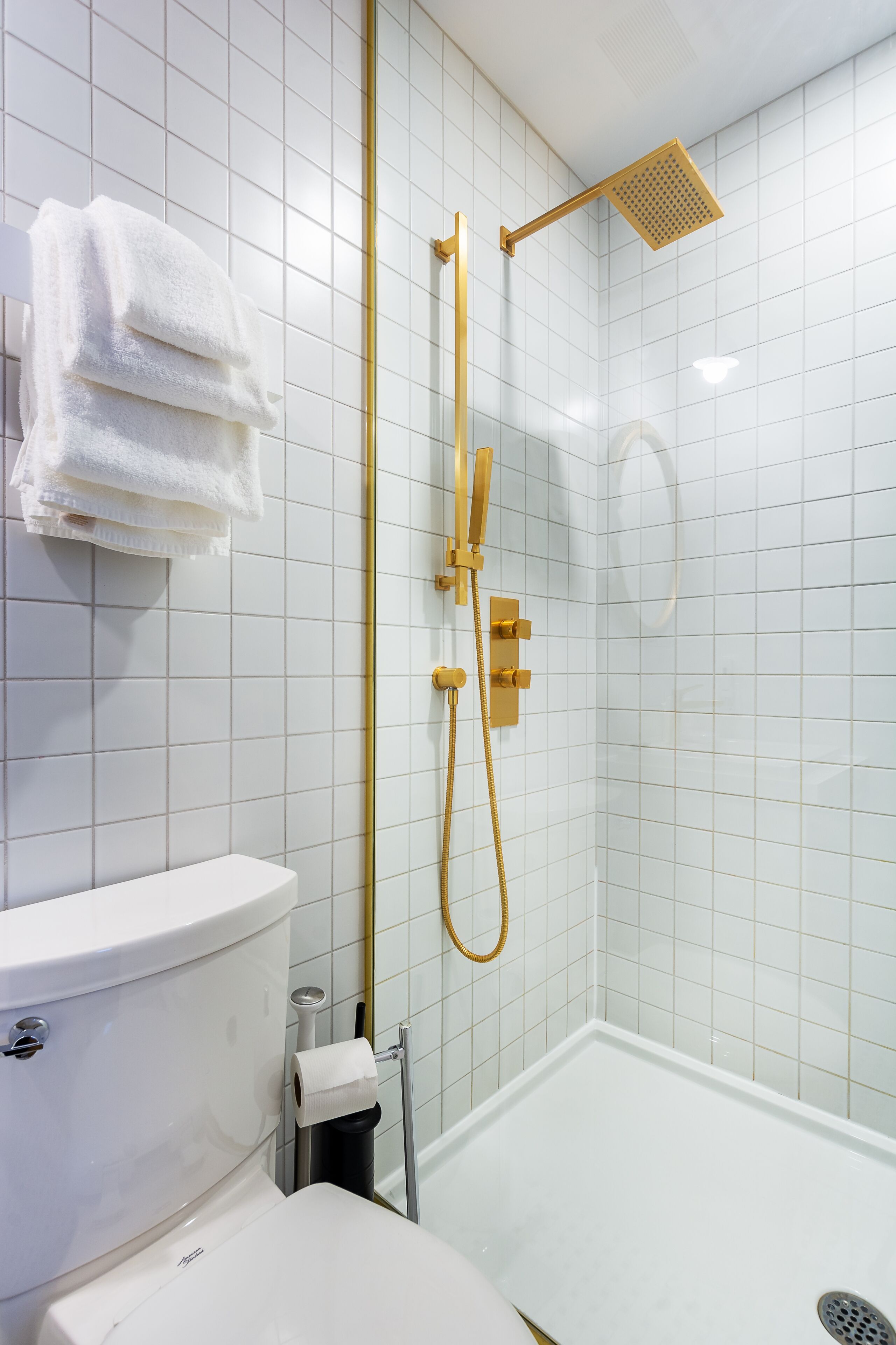 room, 2 queen beds | bathroom | shower, rainfall showerhead, free toiletries, hair dryer