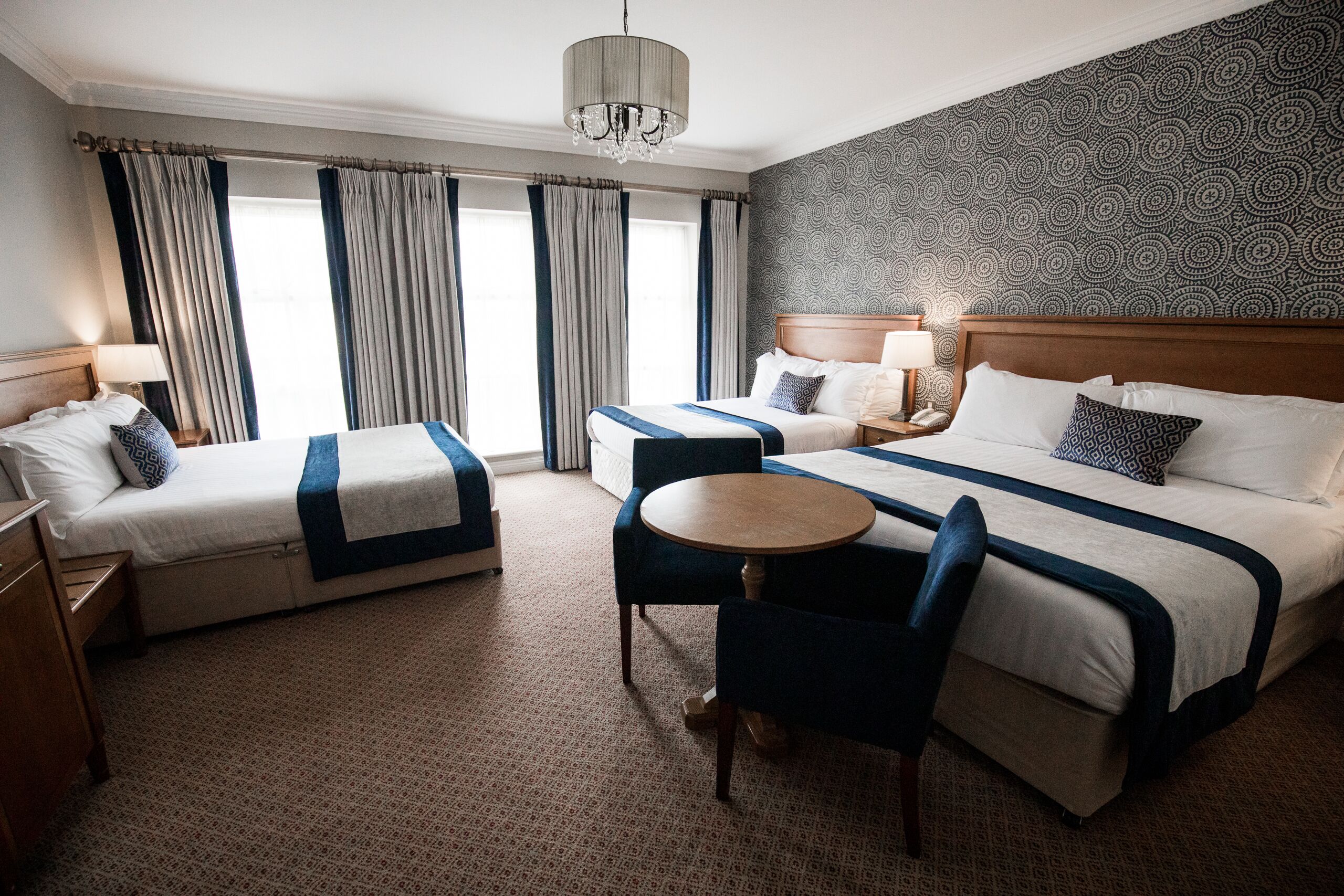 family room | 1 bedroom, in-room safe, desk, laptop workspace