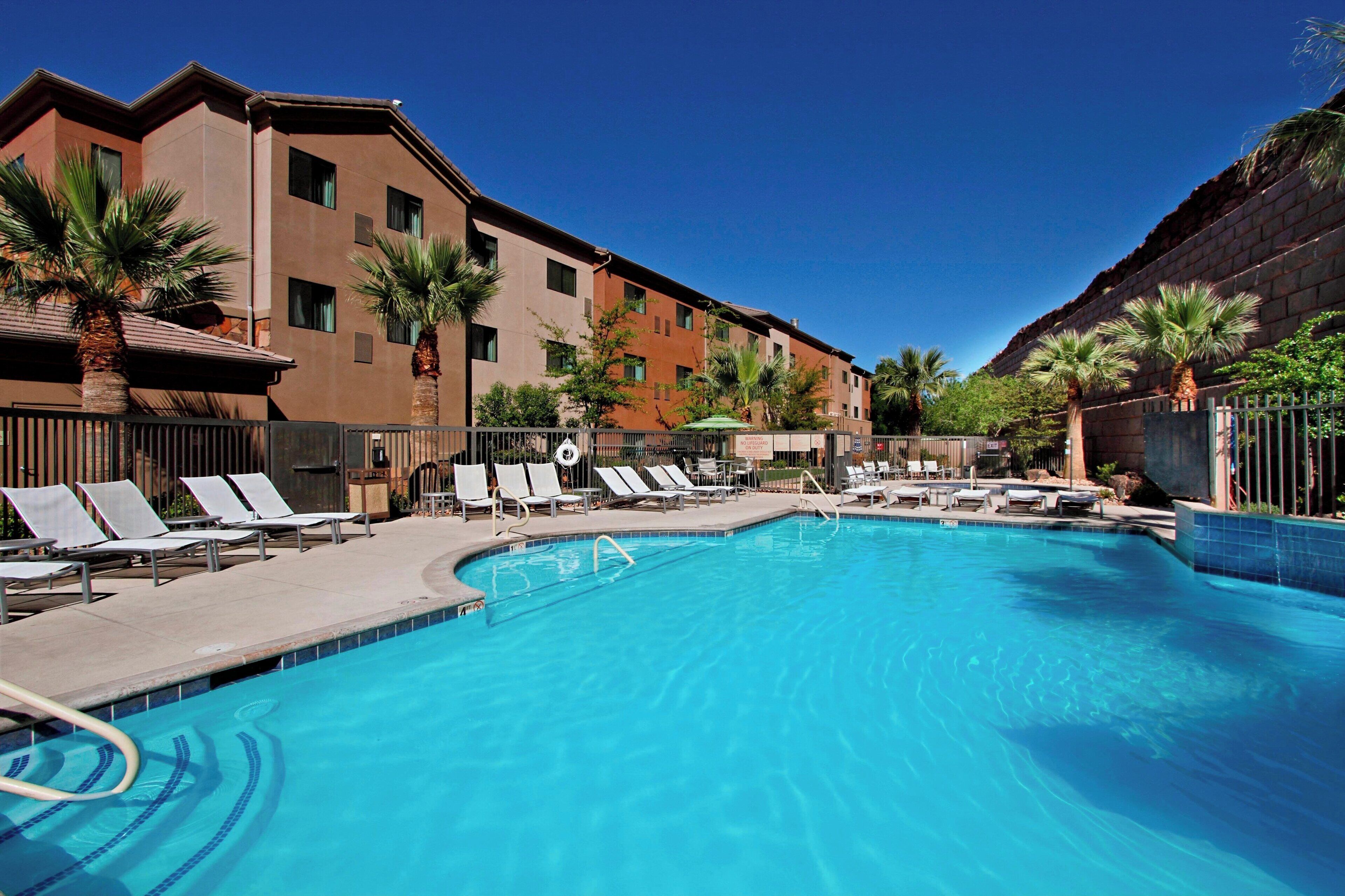 seasonal outdoor pool, open 8:00 am to 11 pm, pool umbrellas