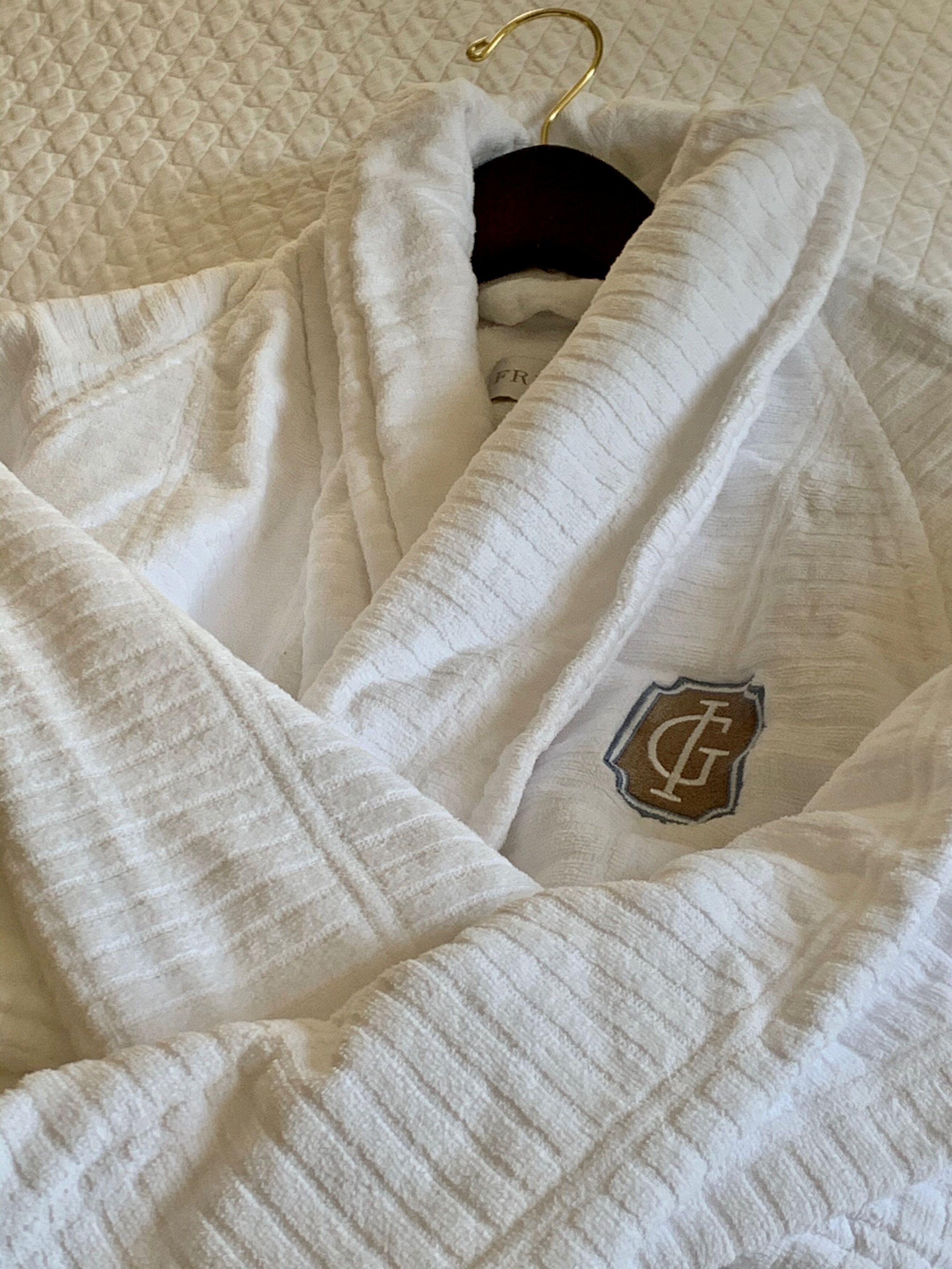 hair dryer, bathrobes, towels