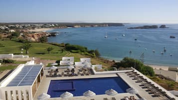 Indoor pool, outdoor pool, pool umbrellas, pool loungers