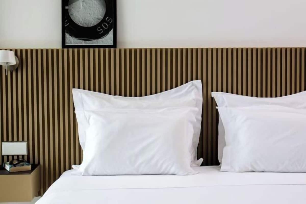 Egyptian cotton sheets, premium bedding, minibar, in-room safe