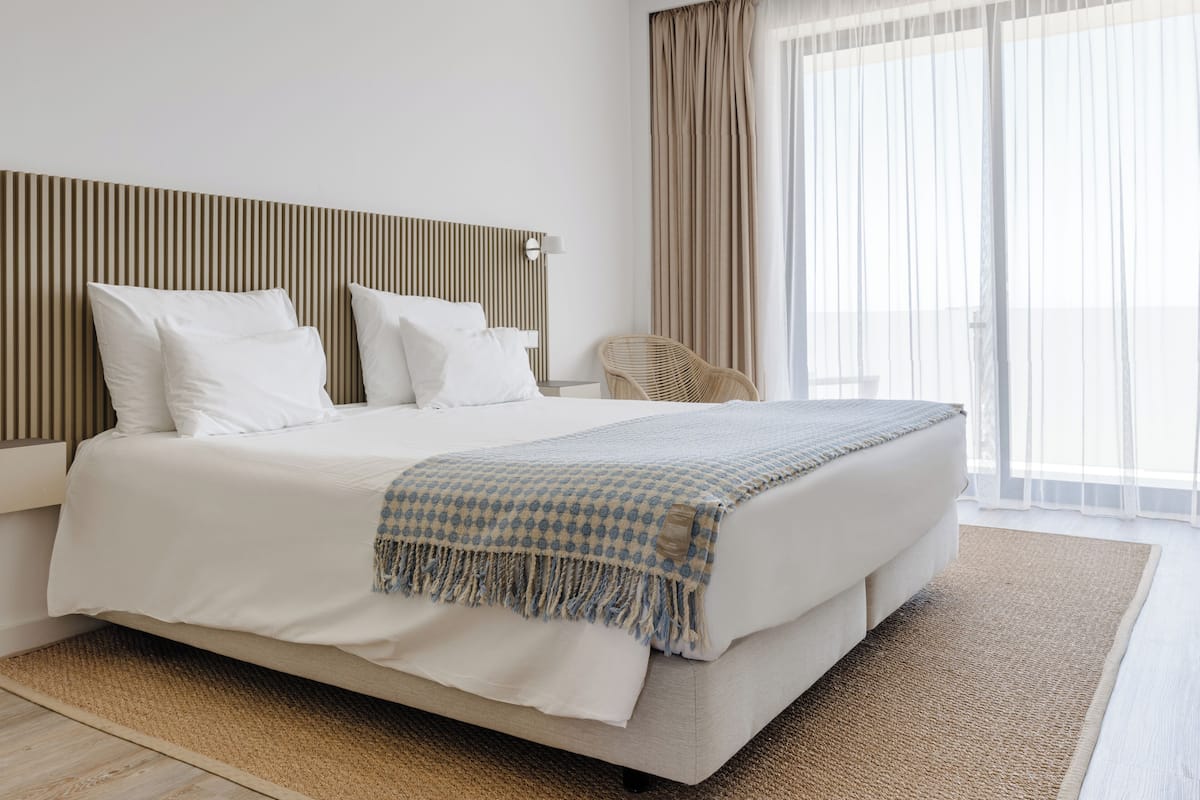 Egyptian cotton sheets, premium bedding, minibar, in-room safe