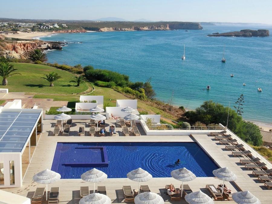 Indoor pool, outdoor pool, pool umbrellas, pool loungers