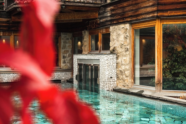 Indoor pool, outdoor pool, open 7:30 AM to 7 PM, pool umbrellas