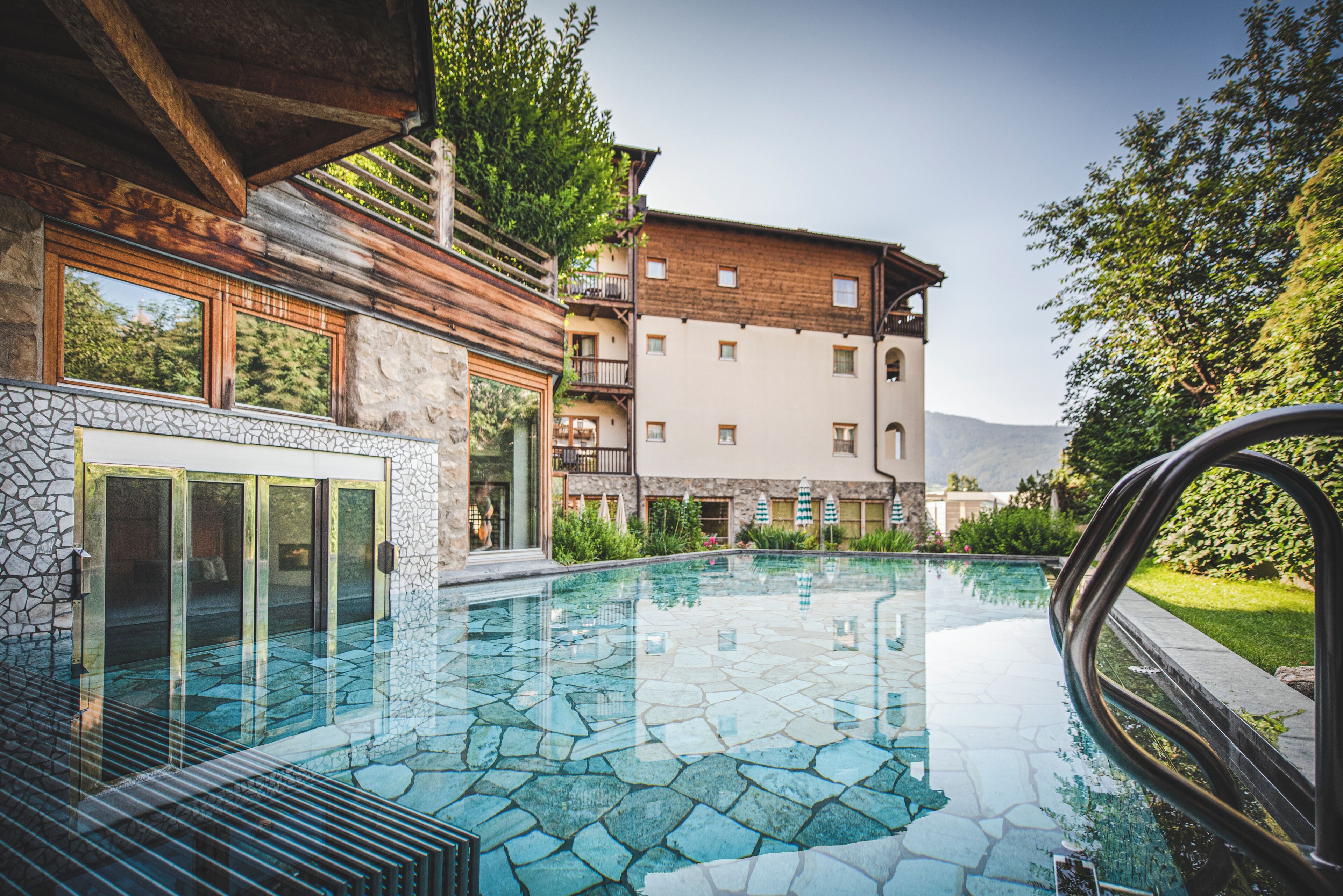 Indoor pool, outdoor pool, open 7:30 AM to 7 PM, pool umbrellas