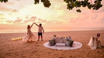 On the beach, sun loungers, beach umbrellas, beach towels