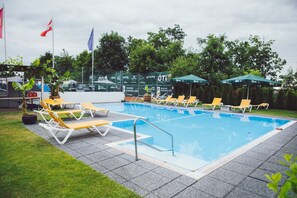 Seasonal outdoor pool, pool umbrellas, sun loungers