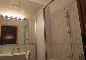 Triple Room | Bathroom | Hair dryer, bathrobes, towels