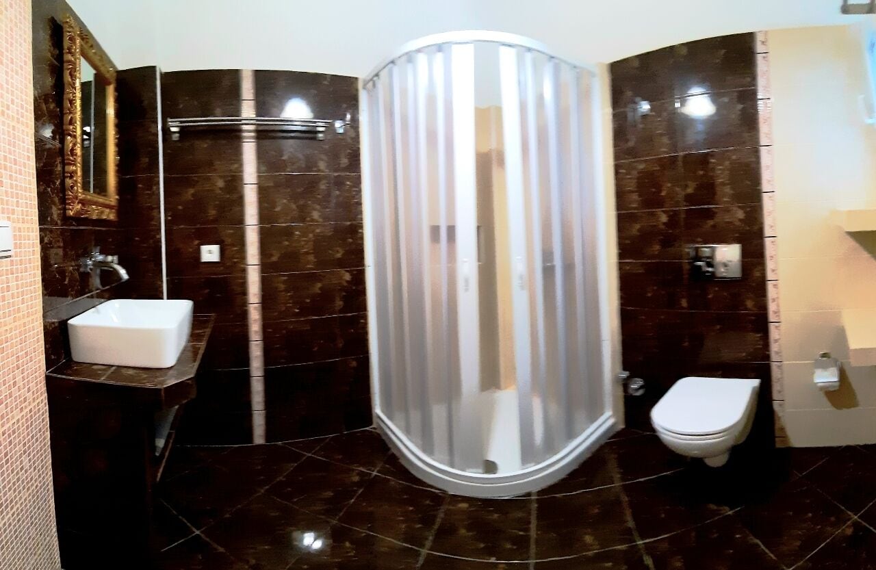 triple room with outdoor jacuzzi | bathroom | shower, hair dryer, towels, soap