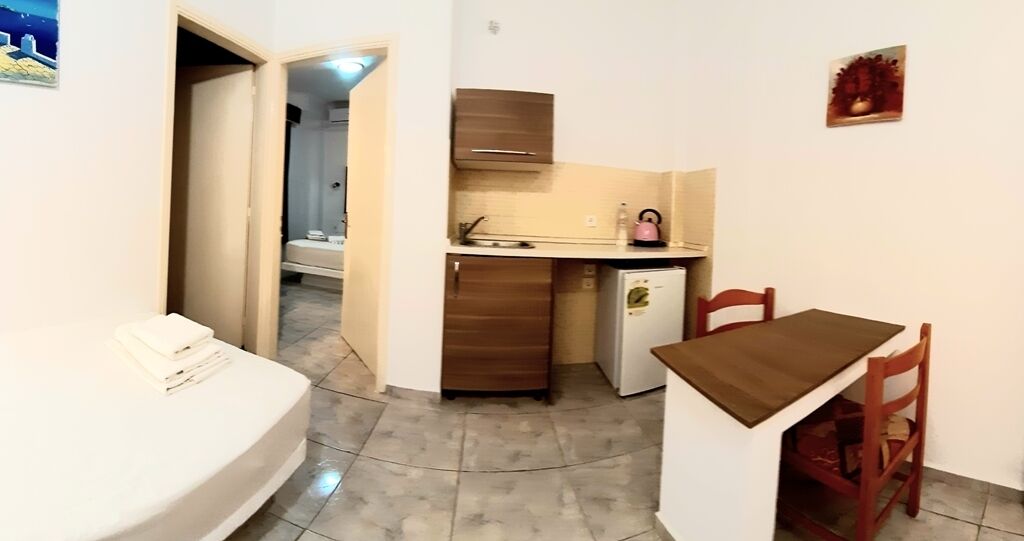 triple room with outdoor jacuzzi | in-room safe, iron/ironing board, free wifi, bed sheets