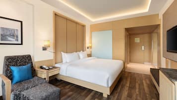 Ropa de cama de alta calidad, minibar, caja fuerte y escritorio