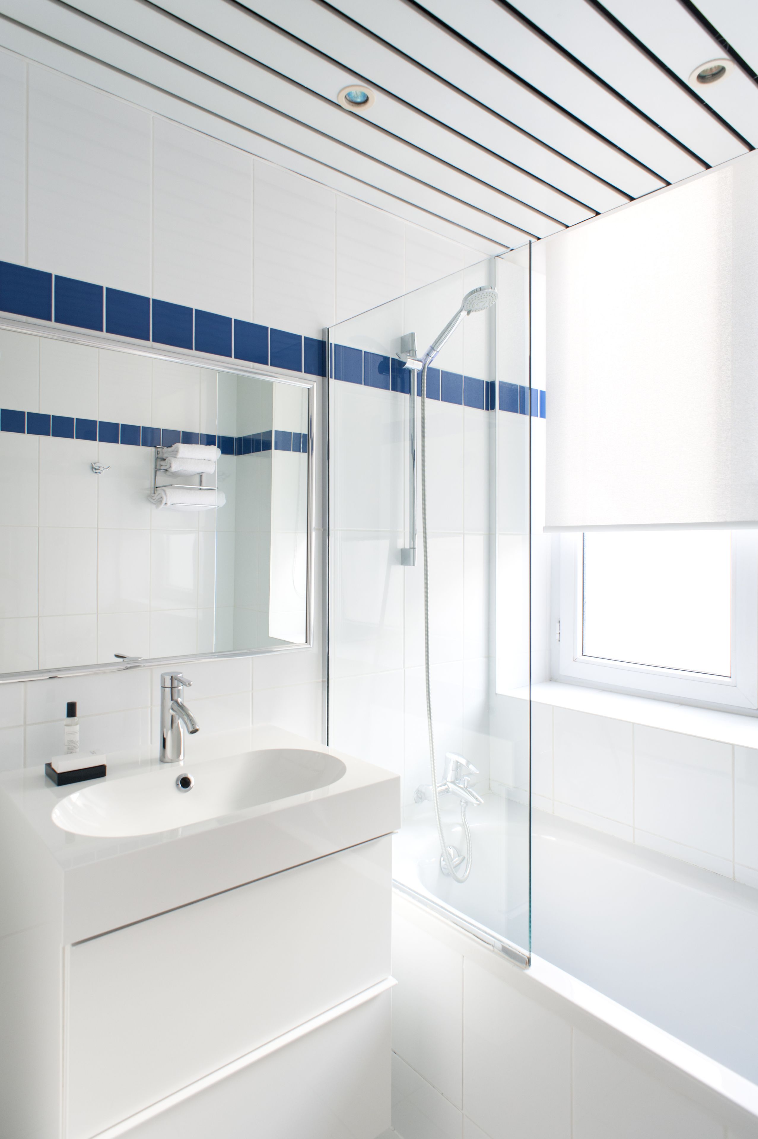 twin room act 3 | bathroom | hair dryer, towels, soap, shampoo