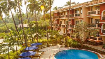 Outdoor pool, open 7:00 AM to 7:00 PM, pool umbrellas, sun loungers