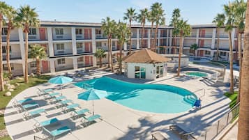 Outdoor pool, a heated pool, open 8:00 AM to 10:00 PM, pool umbrellas