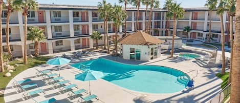 Outdoor pool, a heated pool, open 8:00 AM to 10:00 PM, pool umbrellas