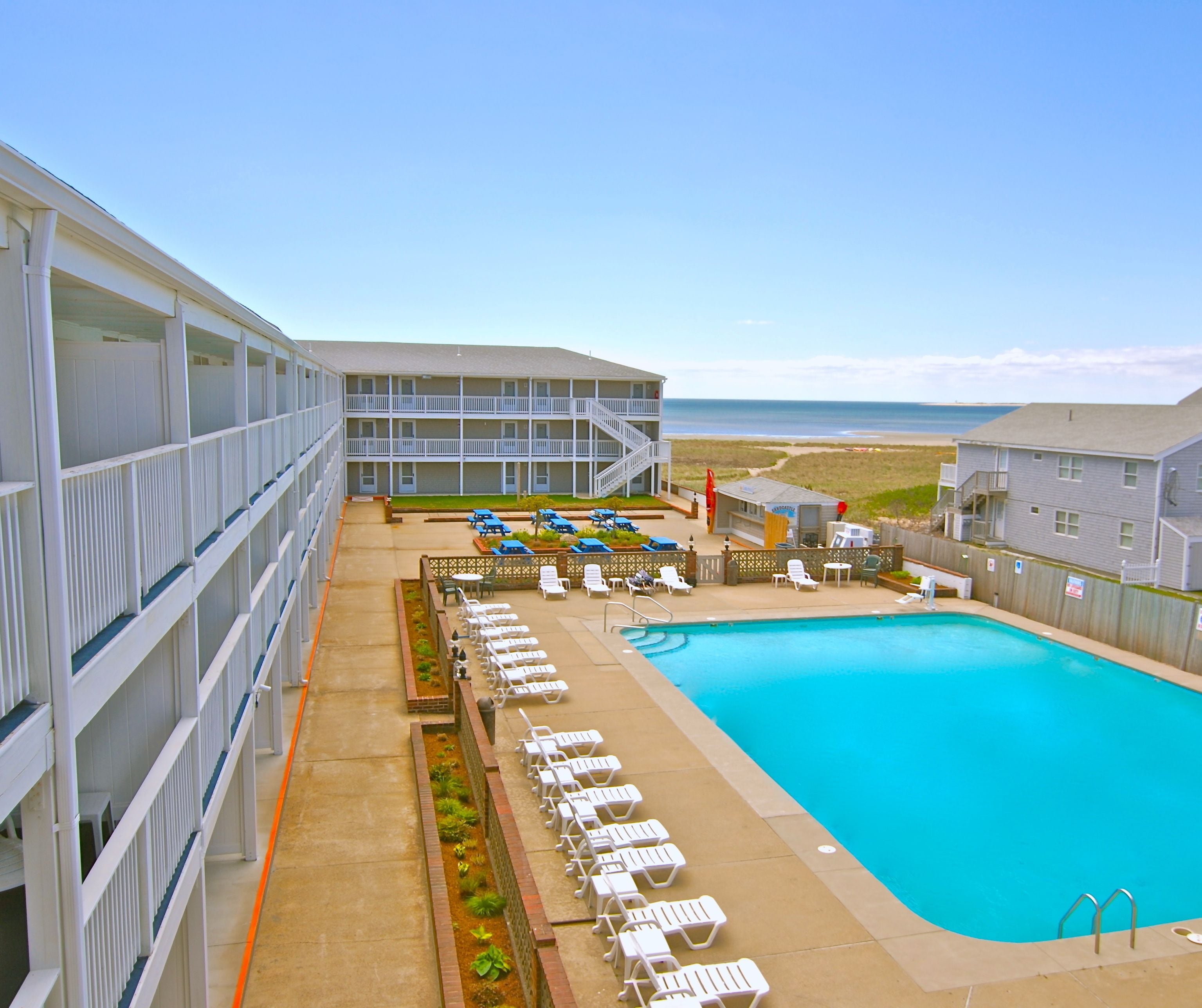 Indoor pool, seasonal outdoor pool, pool umbrellas, pool loungers