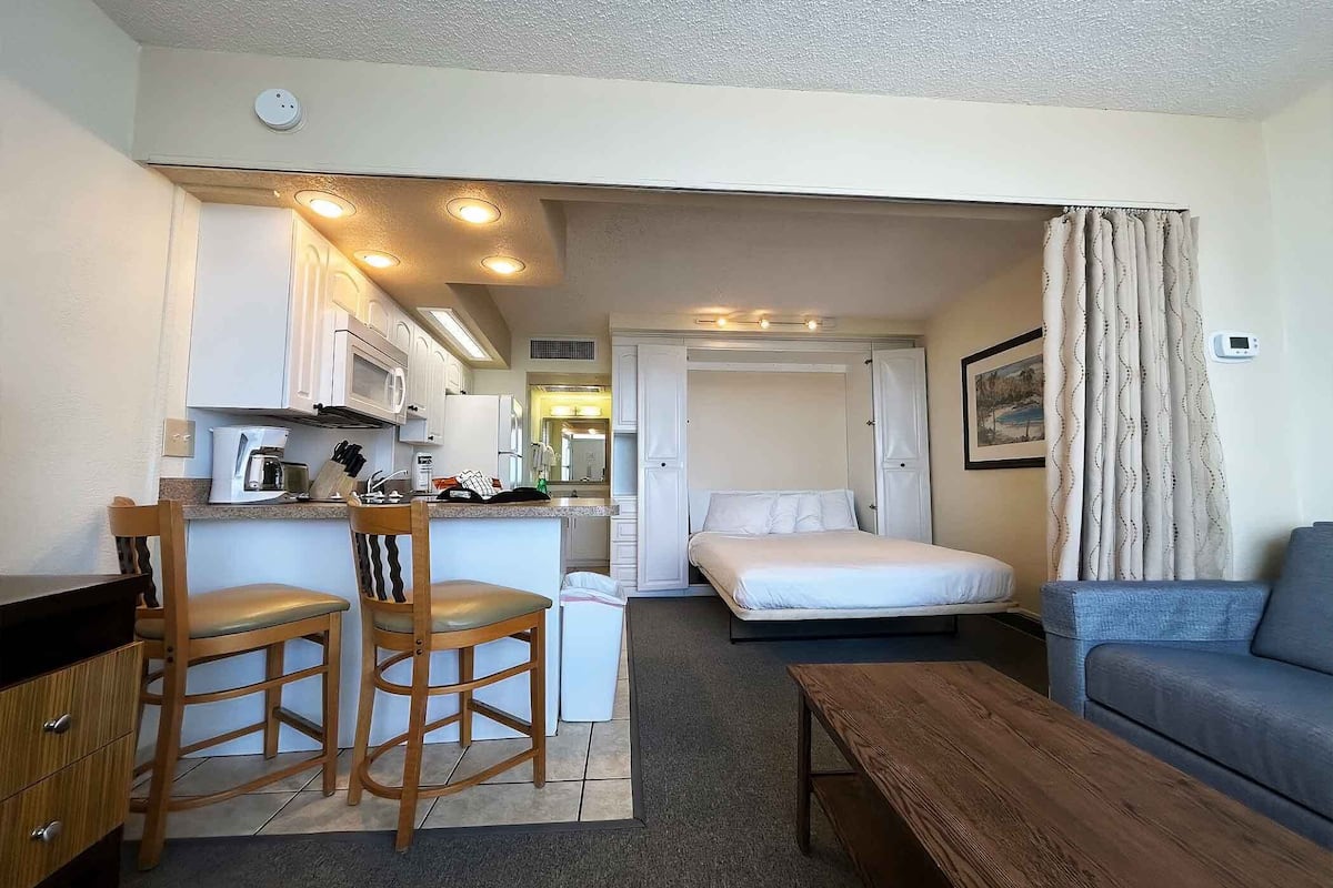 Room, Ocean View (Efficiency) | Blackout drapes, iron/ironing board, WiFi (free), bed sheets