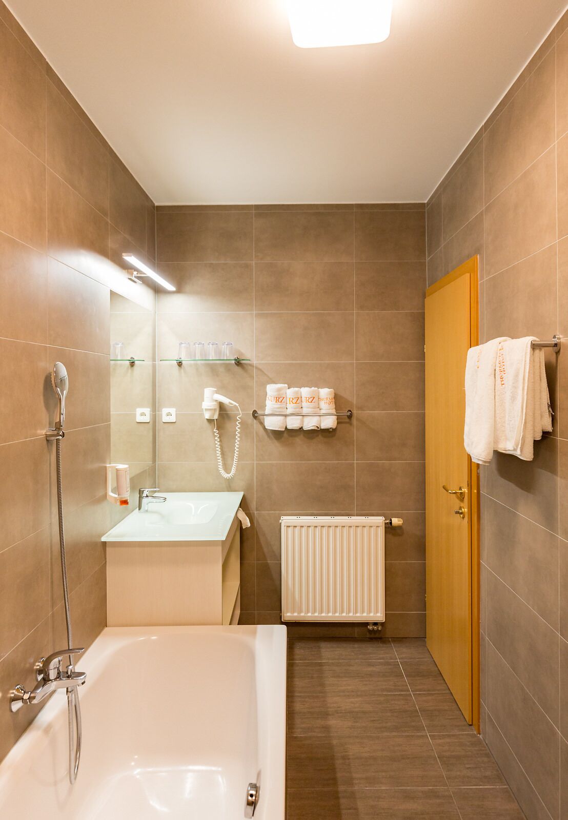 shower, hair dryer, bathrobes, towels