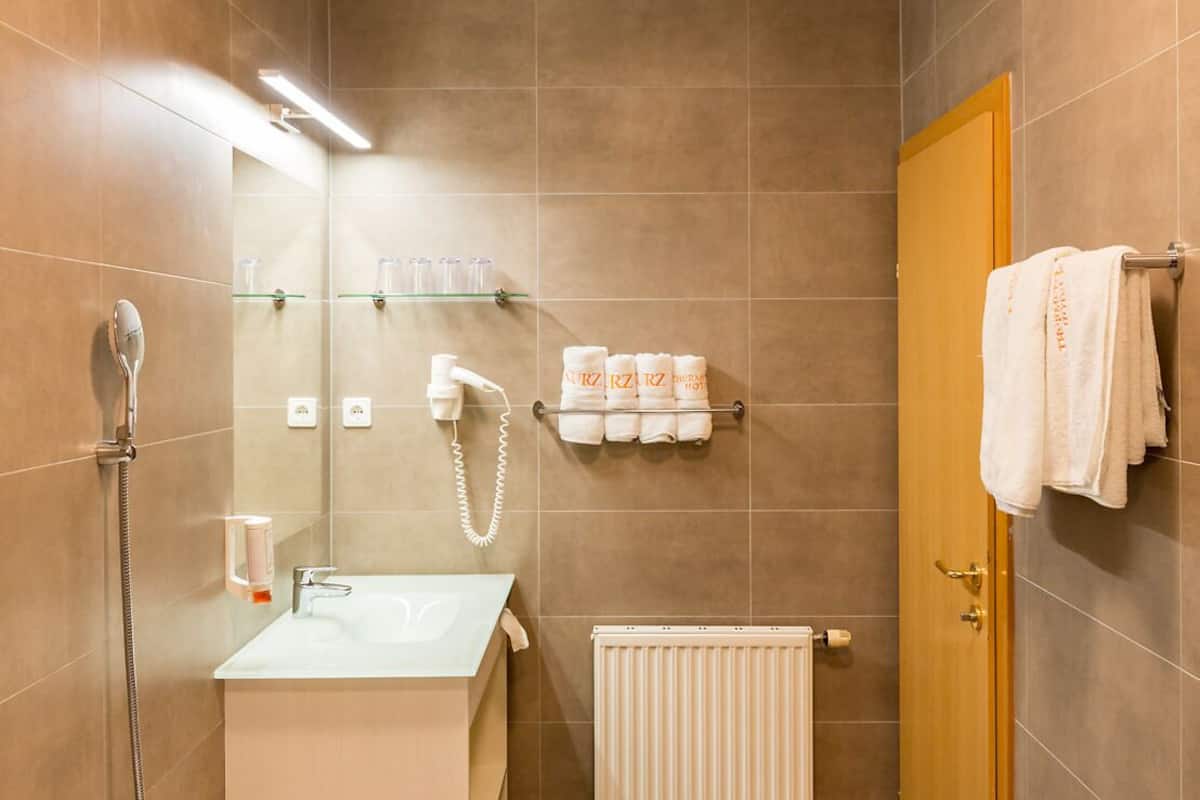 shower, hair dryer, bathrobes, towels