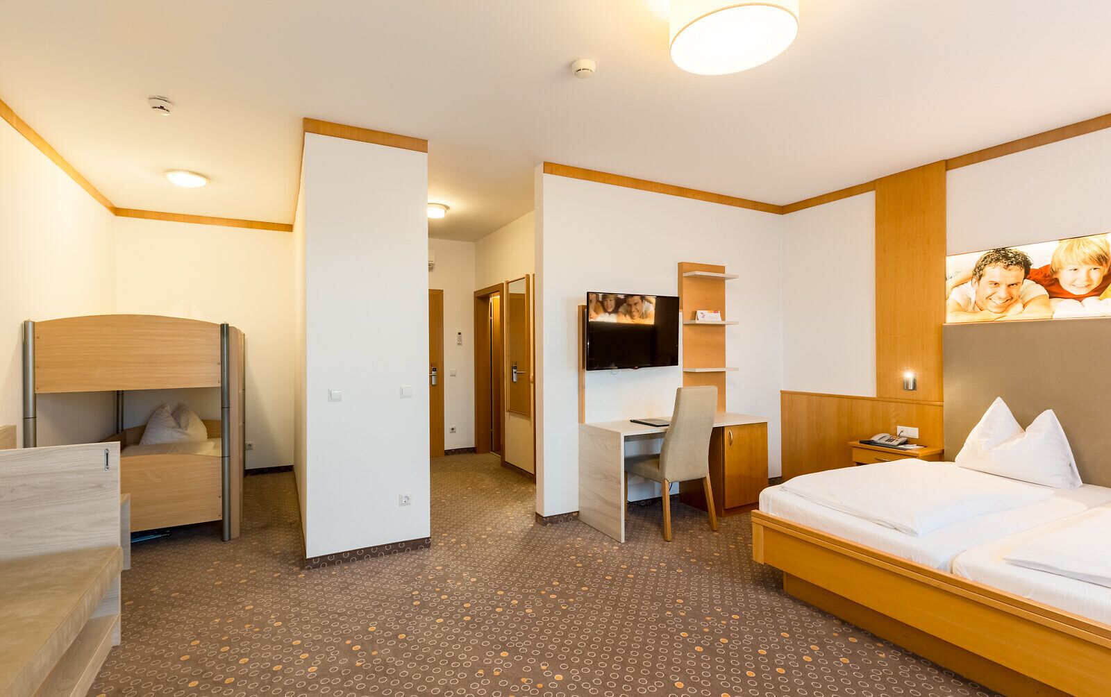 family room | 1 bedroom, in-room safe, desk, blackout curtains