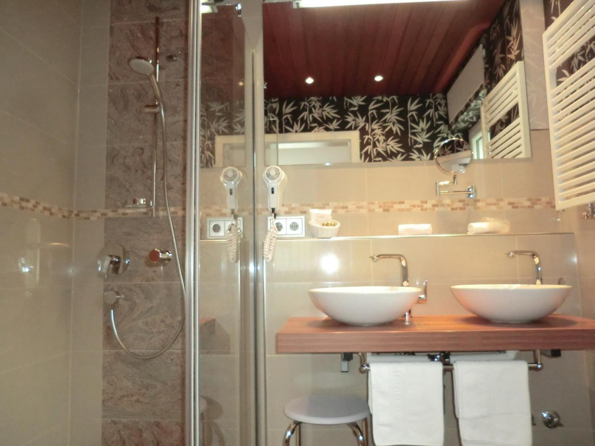 shower, free toiletries, hair dryer, towels