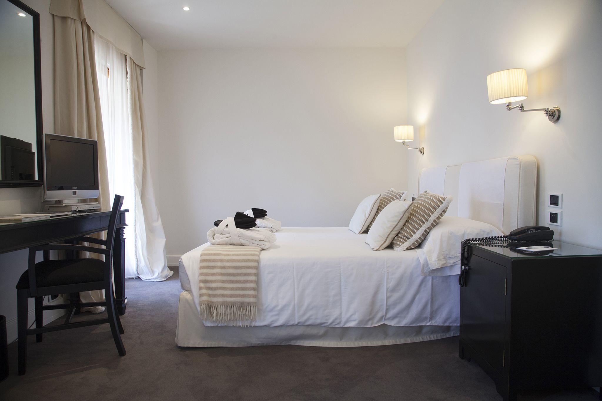 deluxe double room | down duvets, minibar, in-room safe, individually decorated