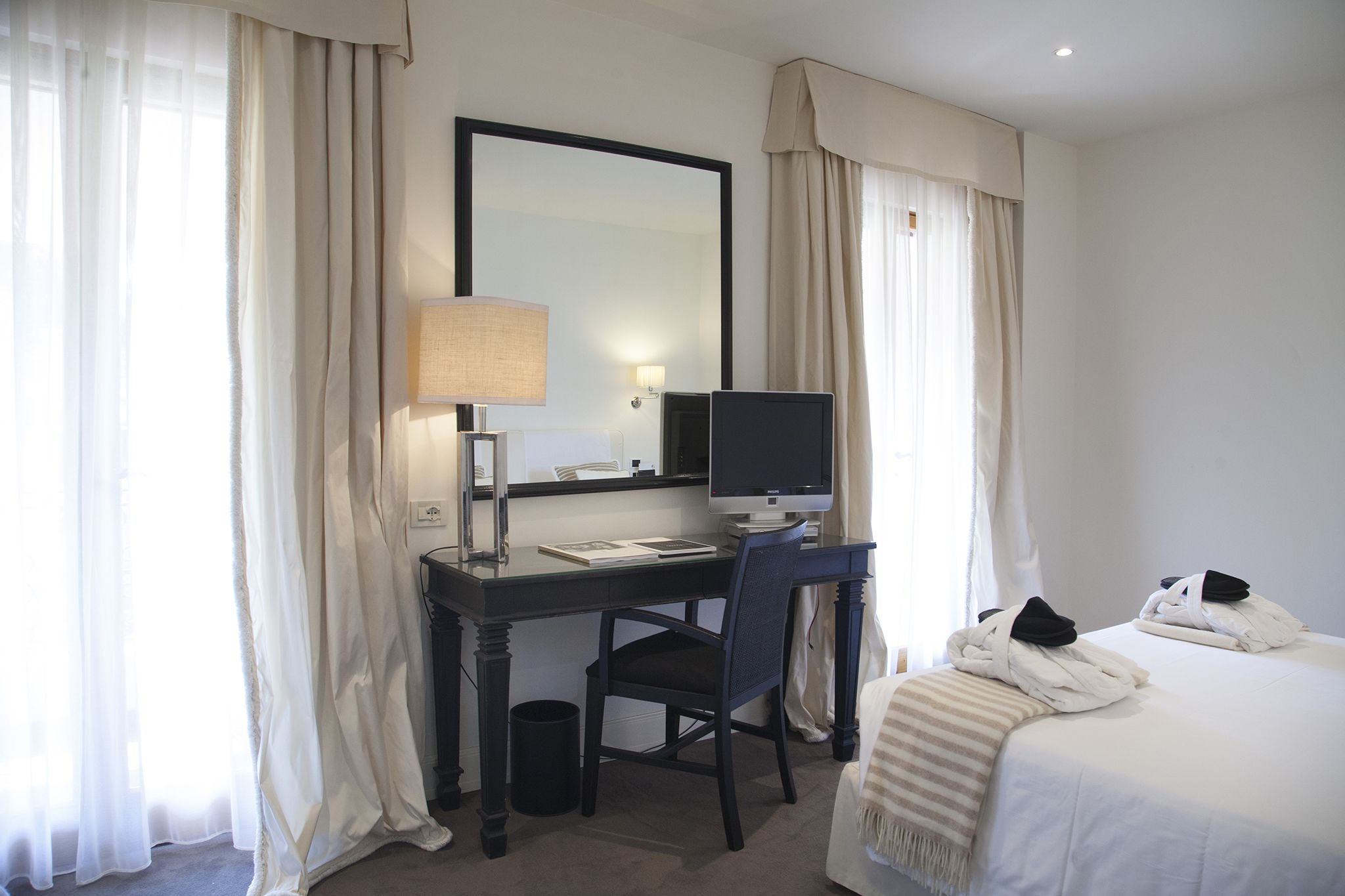 deluxe double room | down duvets, minibar, in-room safe, individually decorated