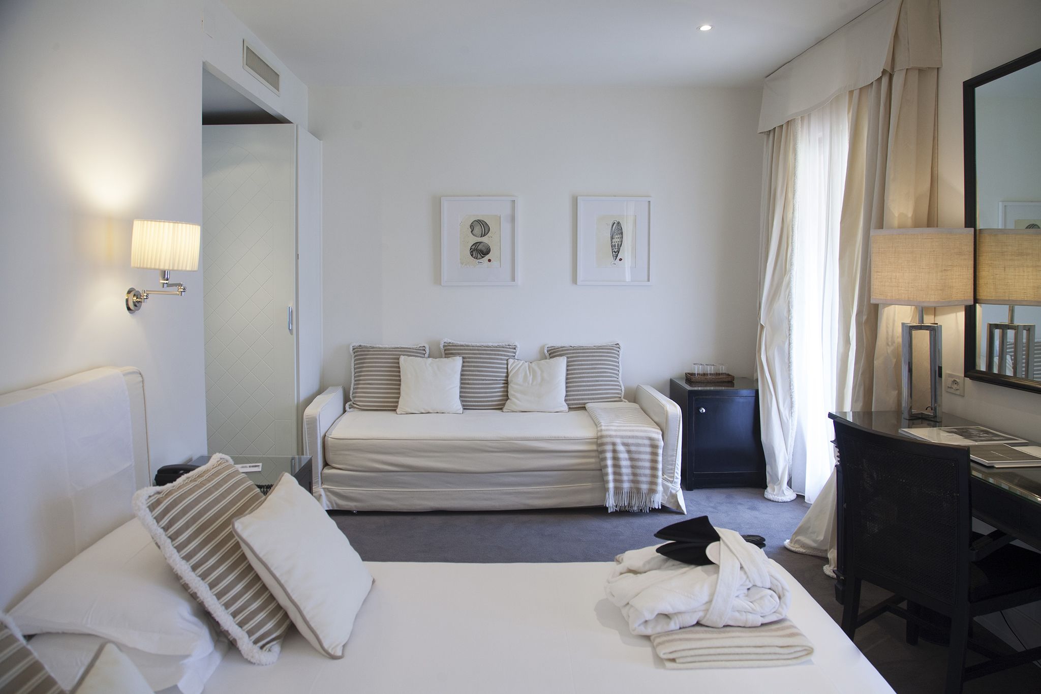 deluxe double room | down duvets, minibar, in-room safe, individually decorated