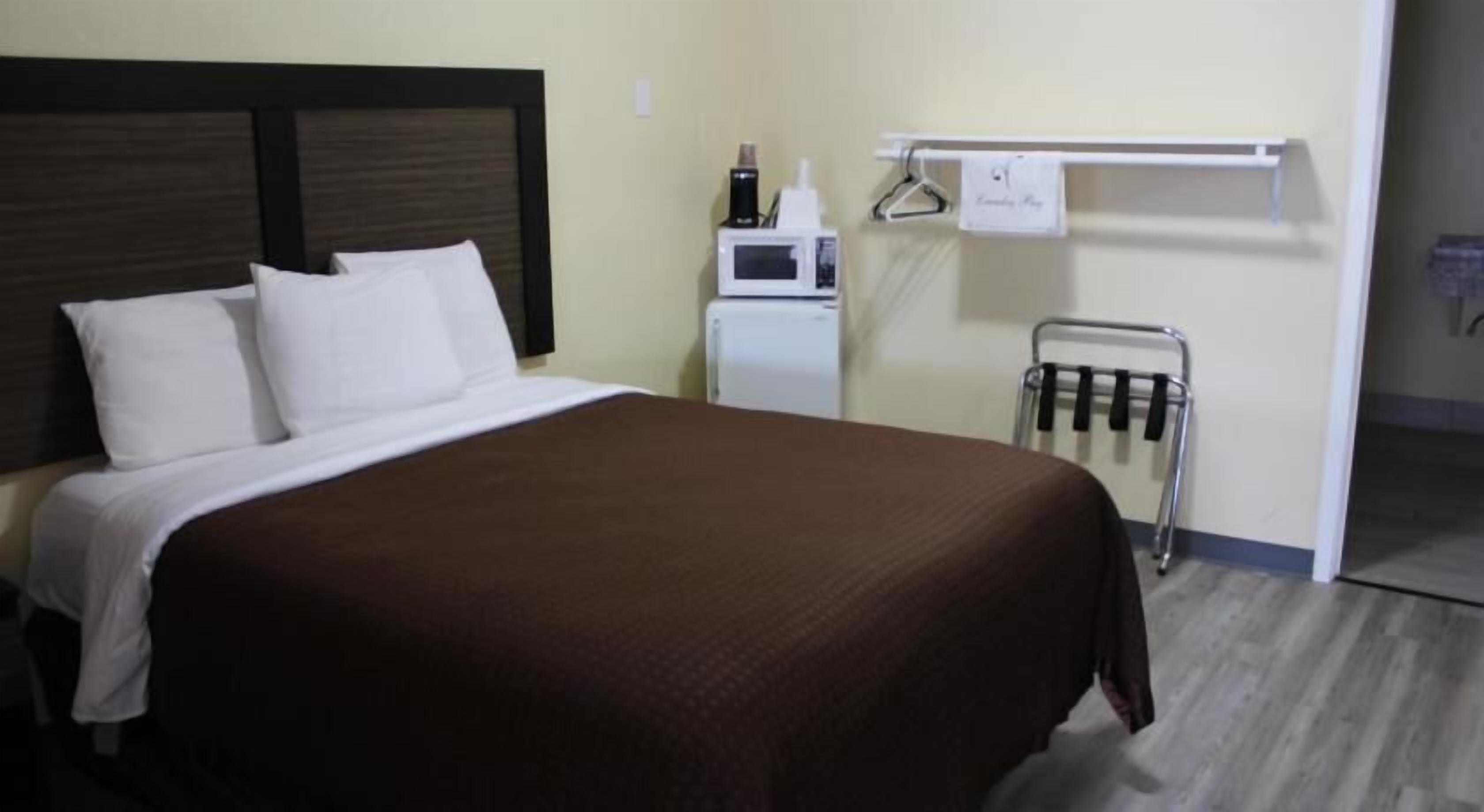 Premium bedding, desk, blackout curtains, iron/ironing board