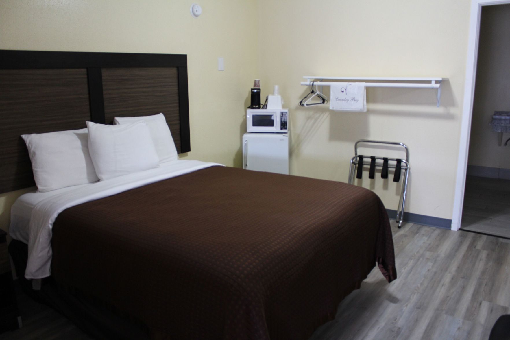 Premium bedding, desk, blackout curtains, iron/ironing board