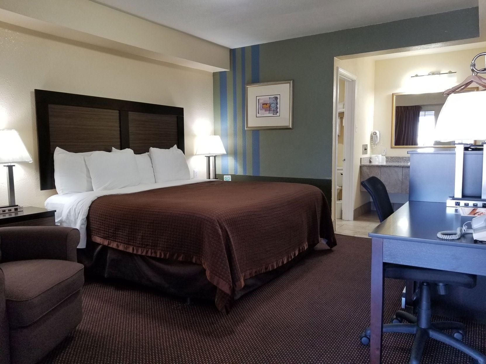 Premium bedding, desk, blackout curtains, iron/ironing board