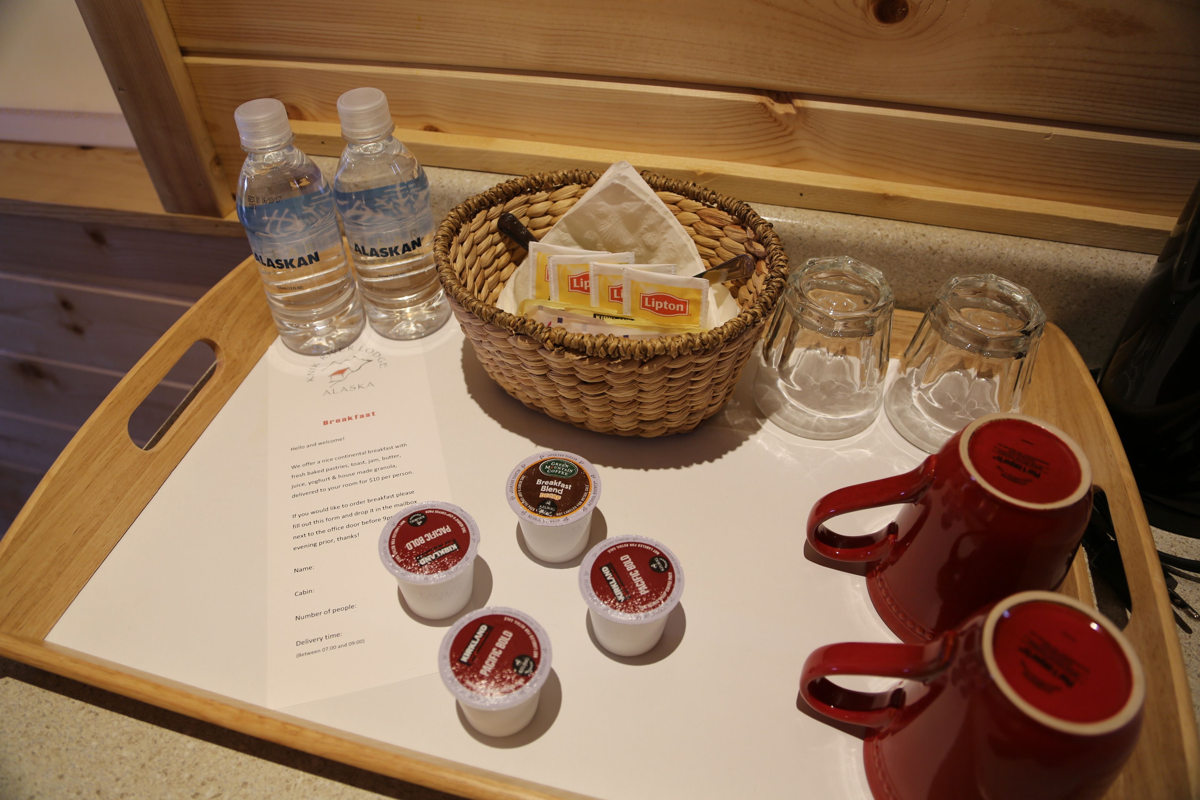 A breakfast tray with Lipton tea bags, Lipton tea, and Lipton iced tea.