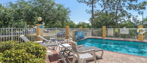 Outdoor pool, open 8:00 AM to 10:00 PM, pool umbrellas, pool loungers
